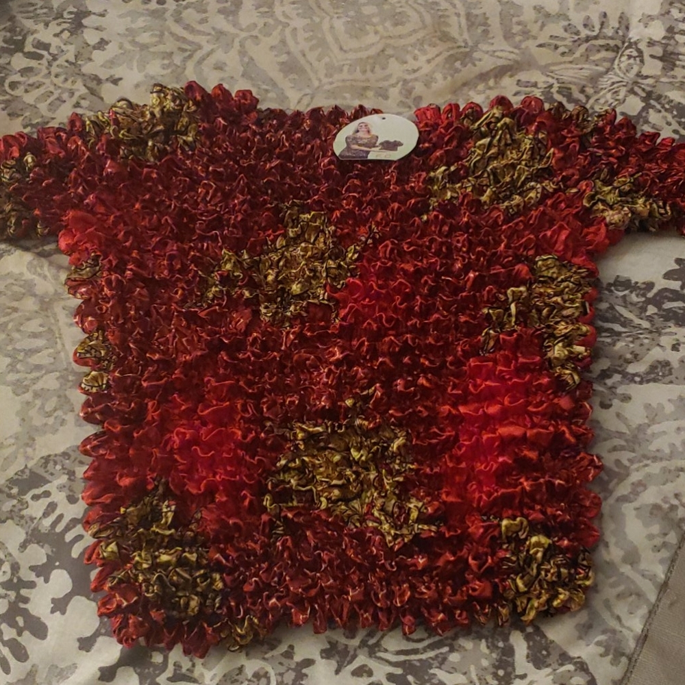 NWT Miracle Top....looks tiny, fits large!